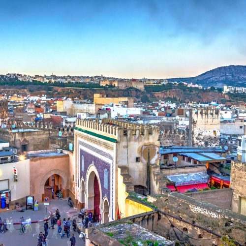 Fez city medina old town skyline in twilight, Morocco